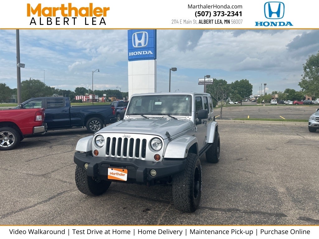 Used 2012 Jeep Wrangler Unlimited Rubicon with VIN 1C4BJWFG5CL205183 for sale in Albert Lea, Minnesota