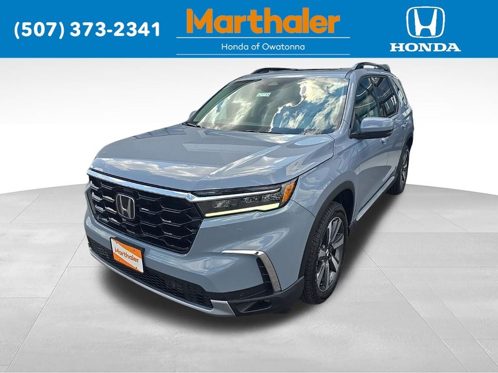 2023 Honda Pilot Touring in Gray — front three-quarter view