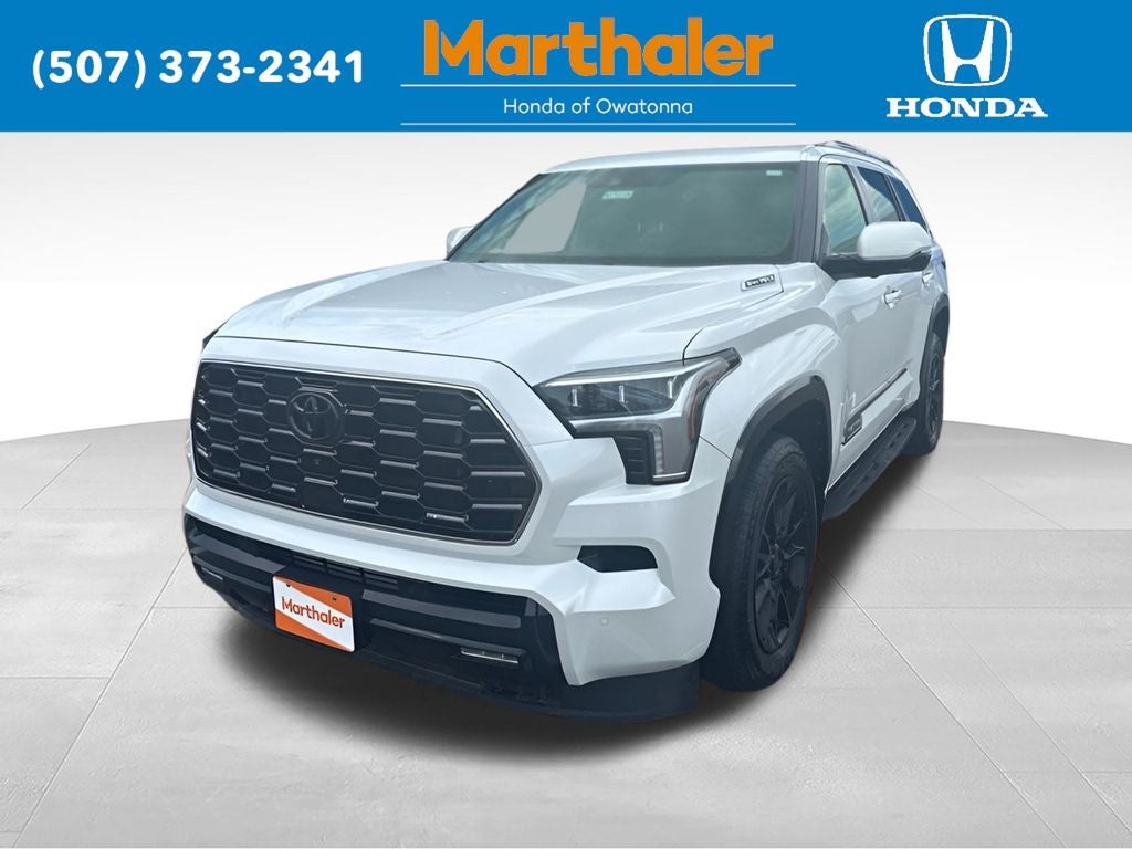 2025 Toyota Sequoia Platinum in White — front three-quarter view